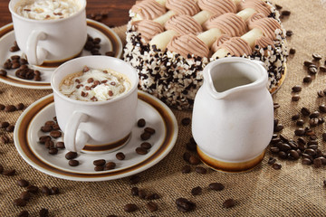 Black coffee with grains and coffee cake