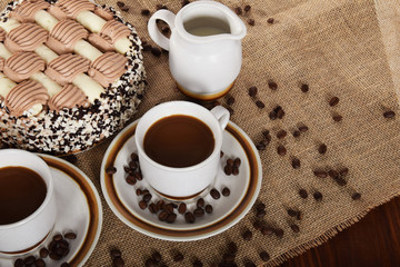 Black coffee with grains and coffee cake