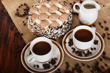 Black coffee with grains and coffee cake