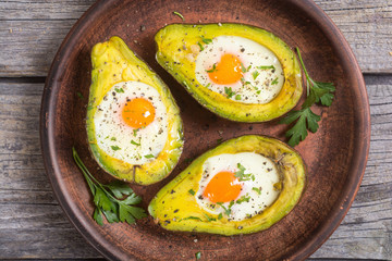 Baked avocado with eggs © whitestorm