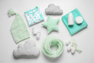Composition with baby accessories on white background