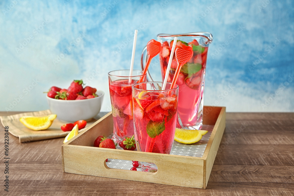 Wall mural Composition with delicious strawberry lemonade on table