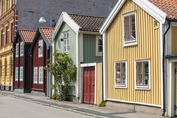 Crooked houses and pavement © blojfo