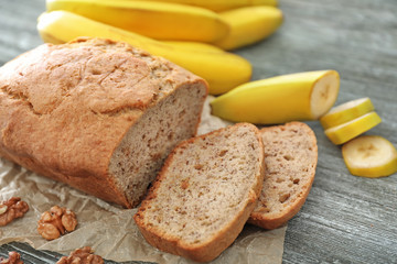 Sliced banana bread on wooden table