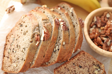 Sliced banana bread with nuts, closeup
