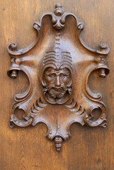 Ornate carved wooden face