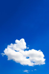 Bright blue sky with white clouds
