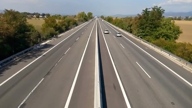 Cars on autobahn time lapse, view from center.