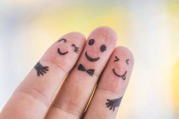 Happy finger family group on blurred background