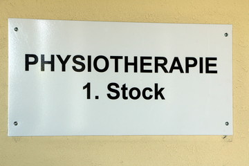 German sign "physical therapy - 1st floor"
