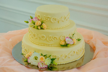 Obraz na płótnie Canvas Cake. Wedding cake decorated with flowers.