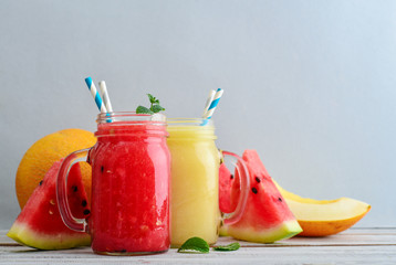 Watermelon and melon smoothie in  jars