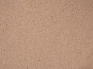 Brown recycled old paper texture or brown craft carton old rough plain light cardboard background