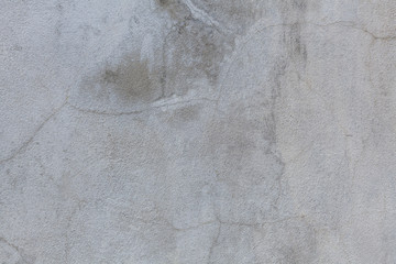 Weathered white painted cement wall background texture