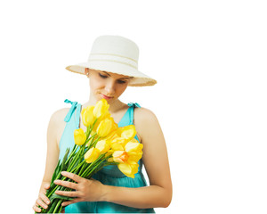 Woman in hat with flowers with his head down isolated on white background.