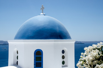 Fototapeta na wymiar Greek blue roof church