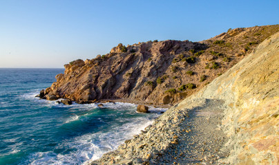 Fototapeta na wymiar Greek island coast with stone