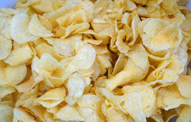 close up on potato chips background