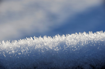 close up on crystal details of frost and snow
