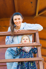 Portrait of smiling mother and daughter