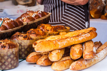 Fresh baguettes and pastries at a local market