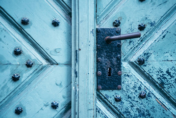 an old metal door handle knocker