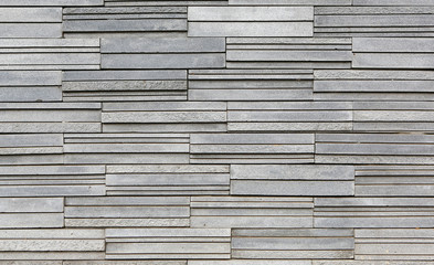 grey stone tile texture brick wall.