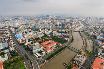 Fototapeta na wymiar Panoramic view of Ho Chi Minh city (or Saigon) in sunset, Vietnam. Saigon is the biggest city and economic center in Vietnam with population around 10 million people.