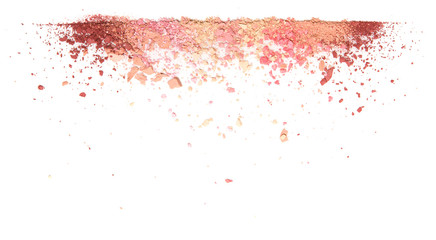 Samples of dry blush, powder, bronzers and highlighter scattered in a line isolated on a white...
