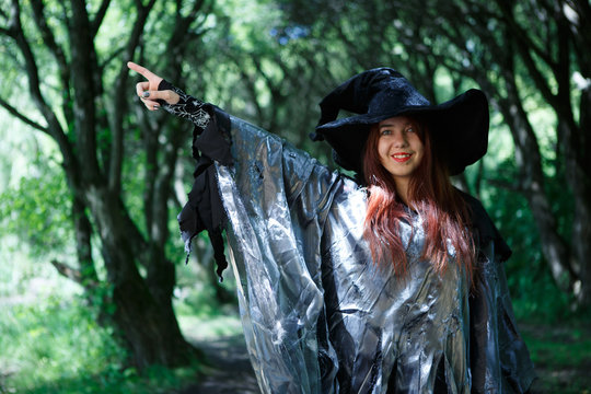 Image of witch in gray cloak