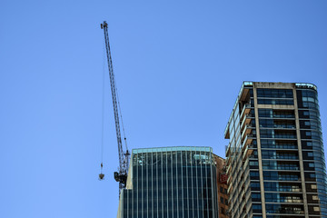 Building construction, renovation, restoration by use of a big crane