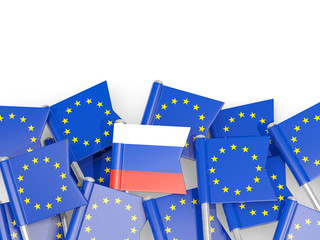 Flag pins of Russia and EU isolated on white