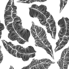 Seamless pattern with hand drawn tropical leaves. Trendy palm branches. Vector illustration