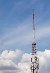 Antenna tower building on Blue sky with Clouds. 