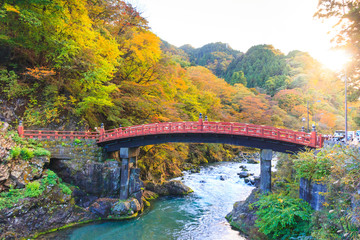 Nikko red Shinkyo bridge in autumn season.
