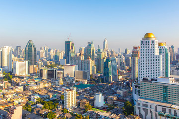 Fototapeta na wymiar Bangkok city skyline aerial view at day time and skyscrapers of midtown bangkok.