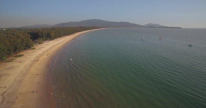 Boats Moored Near Layan And Bang Tao Beach, Phuket, Thailand, Descending Drone Shot
