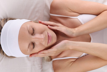 Beauty concept. Portrait Of Attractive Happy Healthy Woman woman enjoying her smooth skin after cosmetic treatment