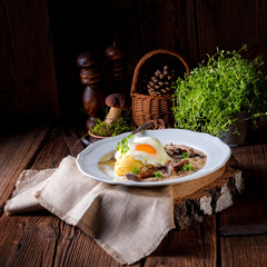 Forest mushroom sauce with fresh mushrooms, potato and poached egg
