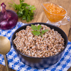 Food background. The boiled buckwheat porridge closeup.