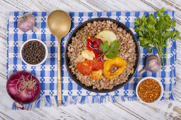 Food background. The boiled buckwheat porridge closeup.