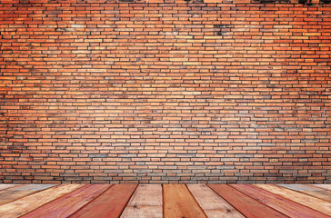 Wood table top perspective on brick wall background for advertising and promote product.