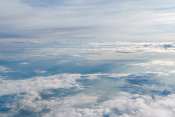 Naklejka na ściany i meble clouds. view from the window of an airplane flying in the clouds