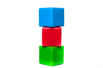 Colorful toy cubes on a white background