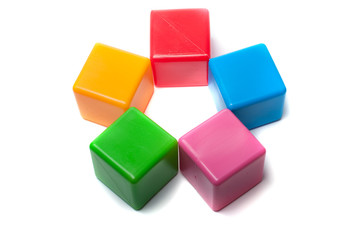 Fototapeta na wymiar Colorful toy cubes on a white background