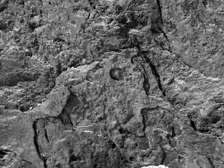 Abstract black and white ancient granite rock texture.