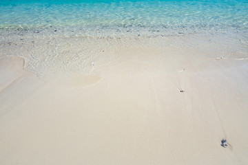 Clear sandy beach, turquoise sea for summer vacation.