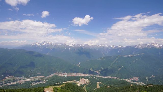 clouds on sky over mountains time lapse