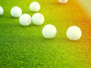 top view flat lay of golf balls on grass background, the concept of a sport for the rich, luxury, fitness, game