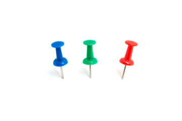 Three color push pin and on isolated white background